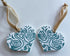 Hand-printed Wooden Heart Decoration with a Turquoise Swan Design.