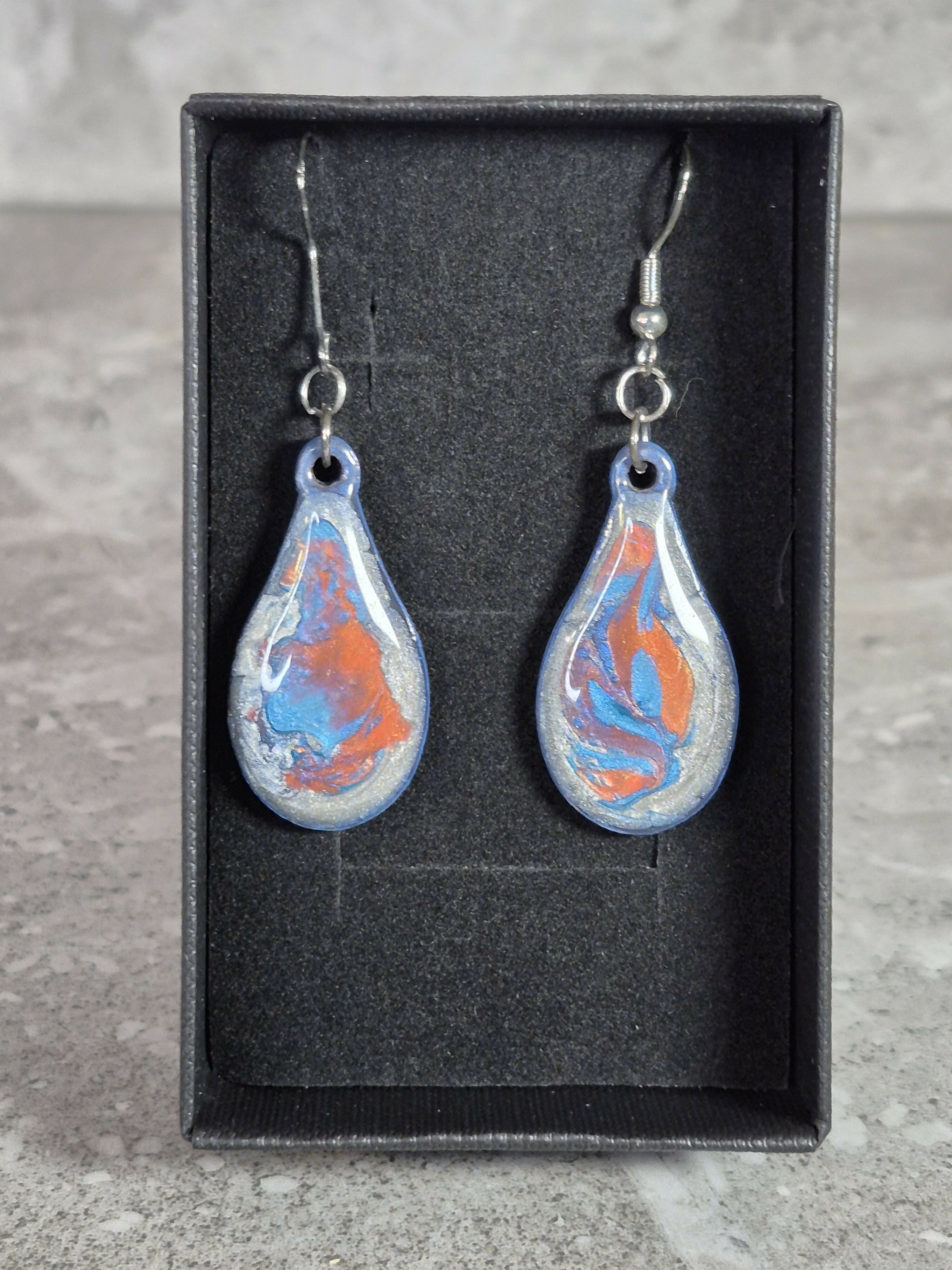 Handcrafted Teardrop Earrings With Blue, Silver And Red Colours