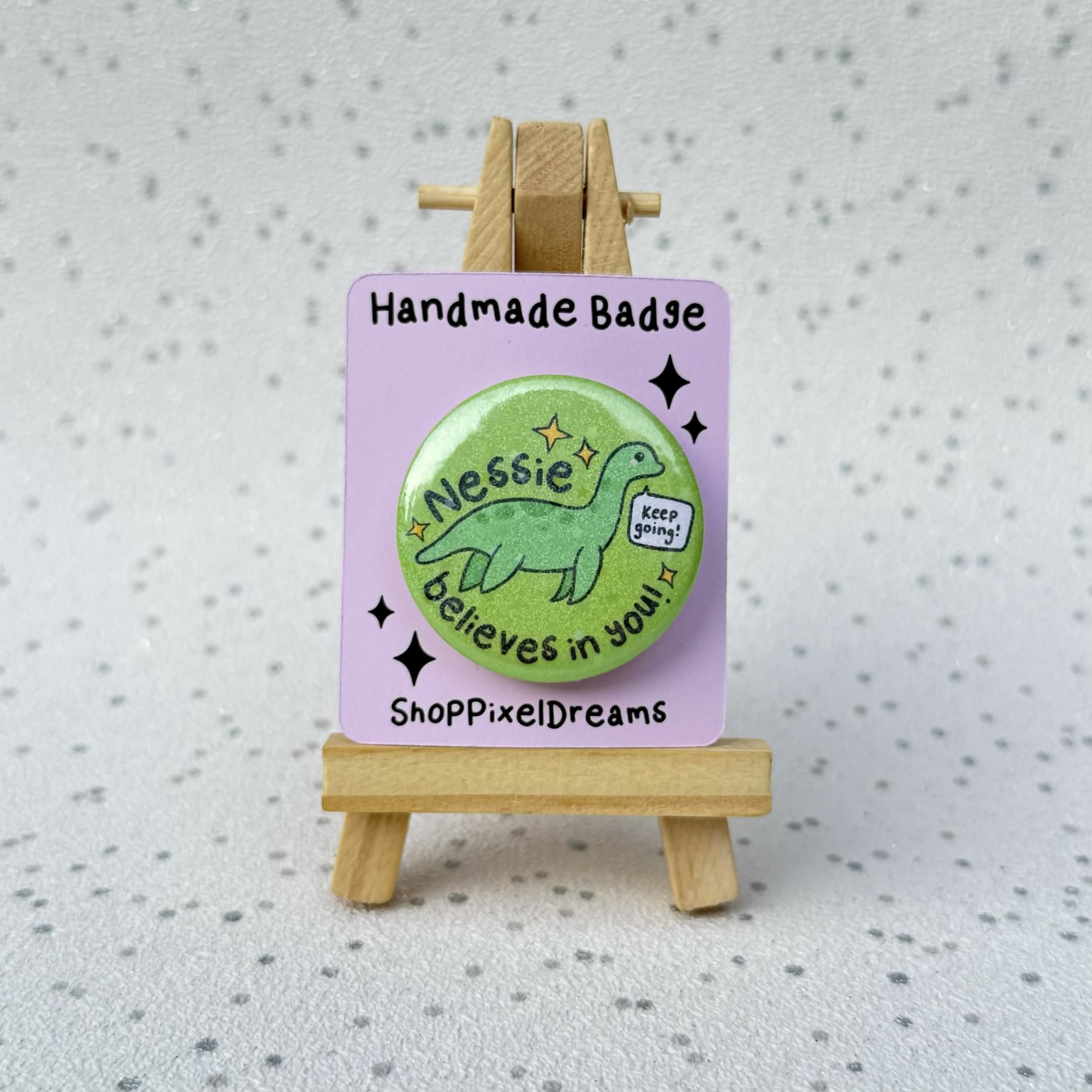 Nessie Believes in You Motivational Cryptid Holographic Pin Badge