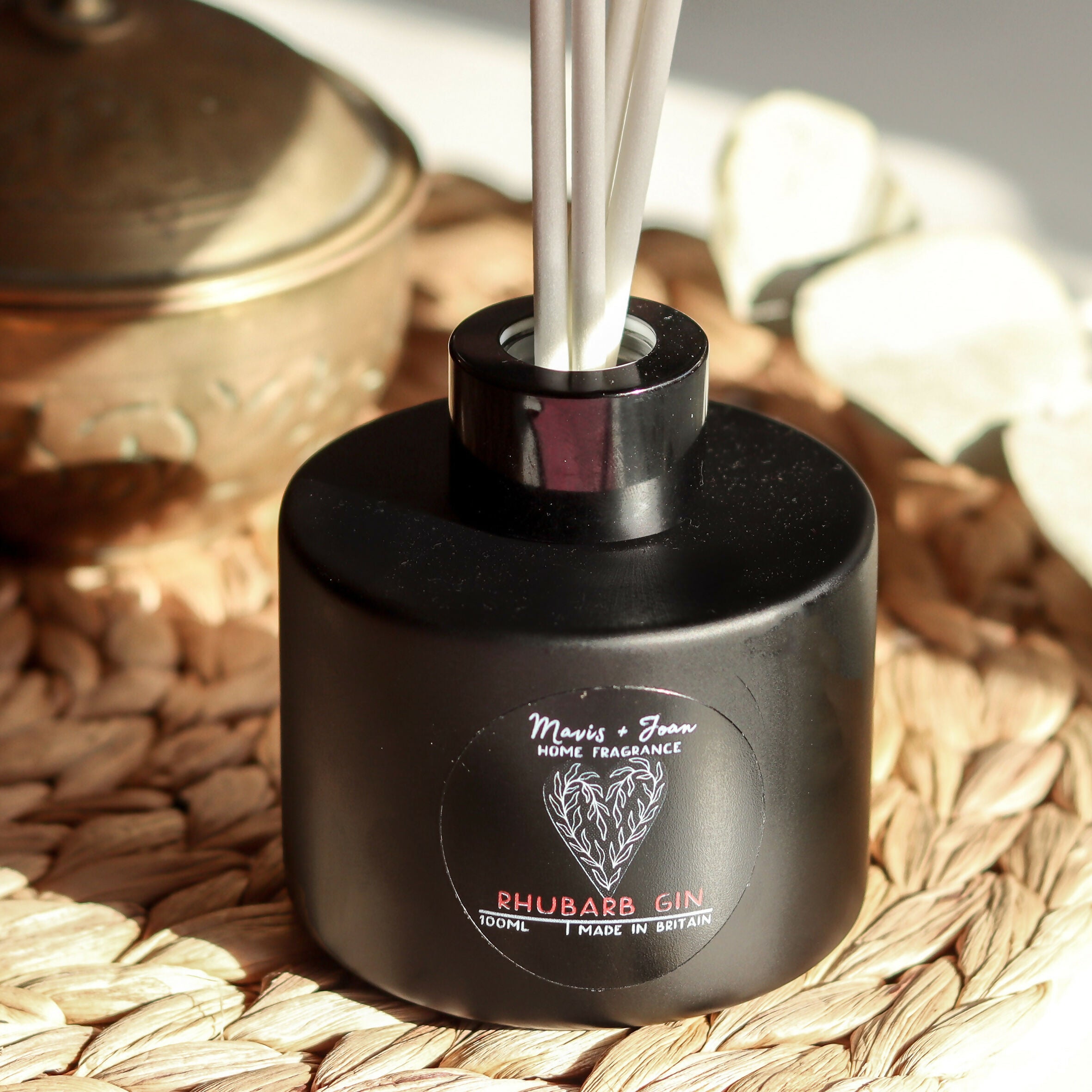Reed Diffuser with black glass bottle and white reeds