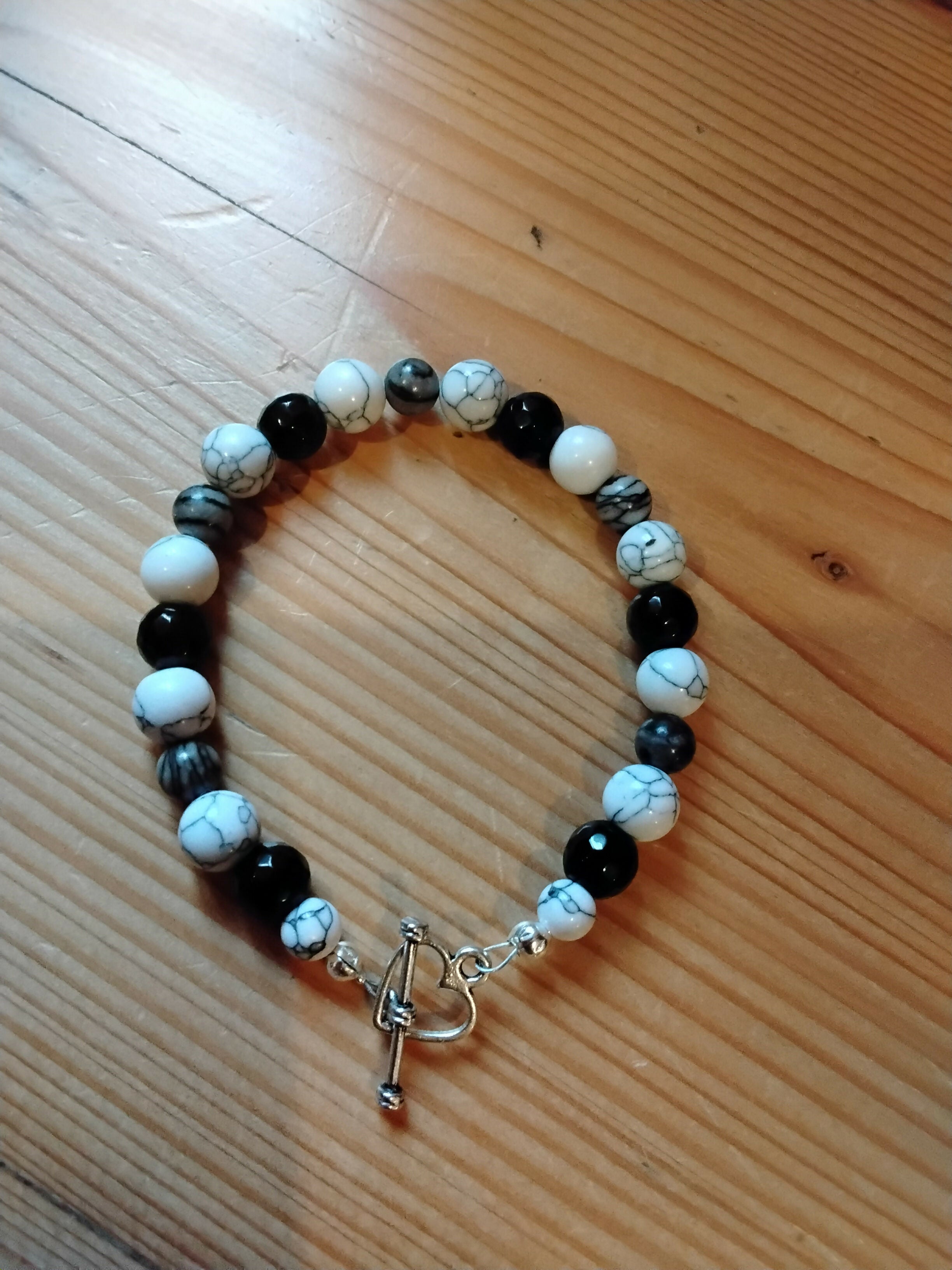 Tibetan Silver Toggle Catch Bracelet with Grey Vein Howlite, Faceted Onyx and Siltstone.