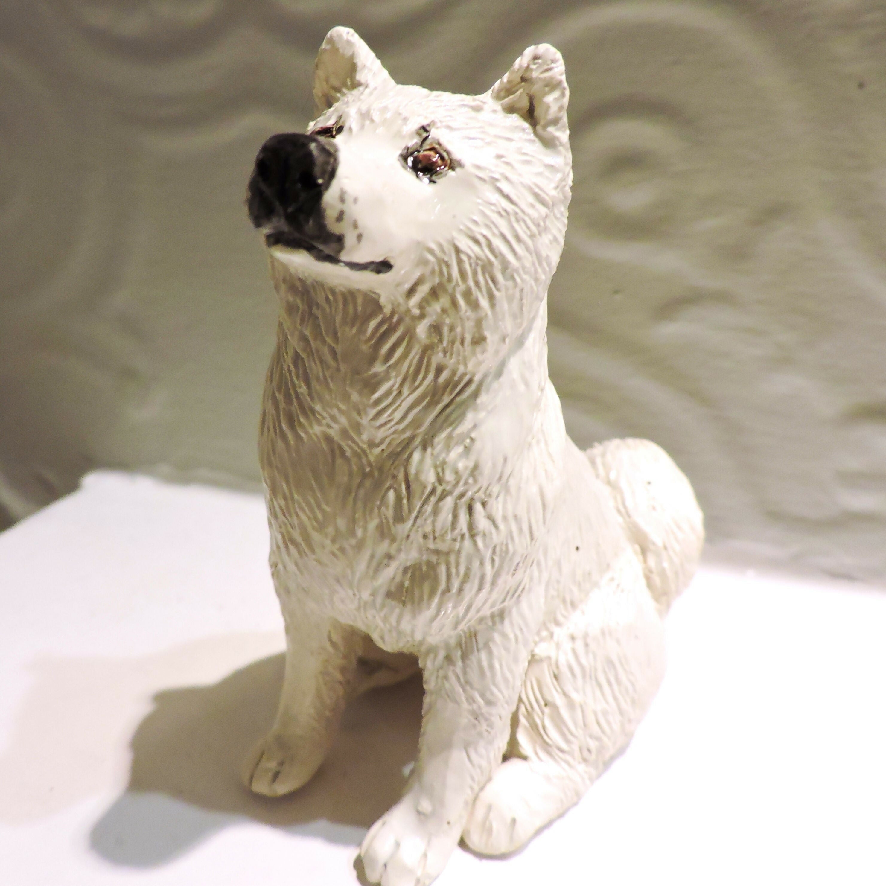 Ceramic Samoyed dog sculpture