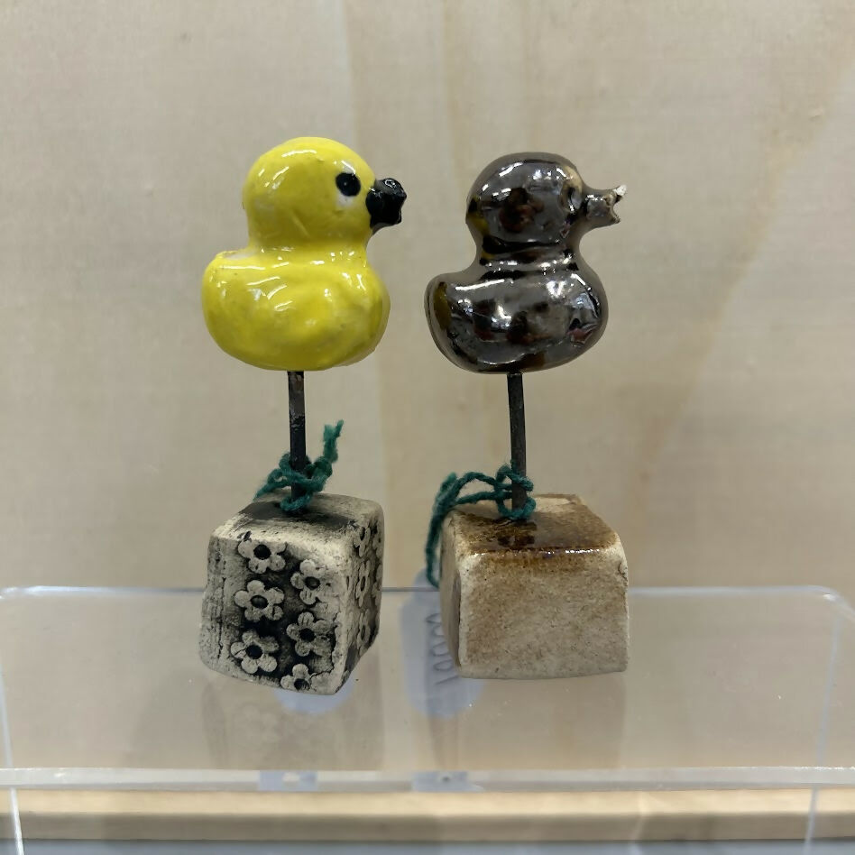 Duckies On A Wire