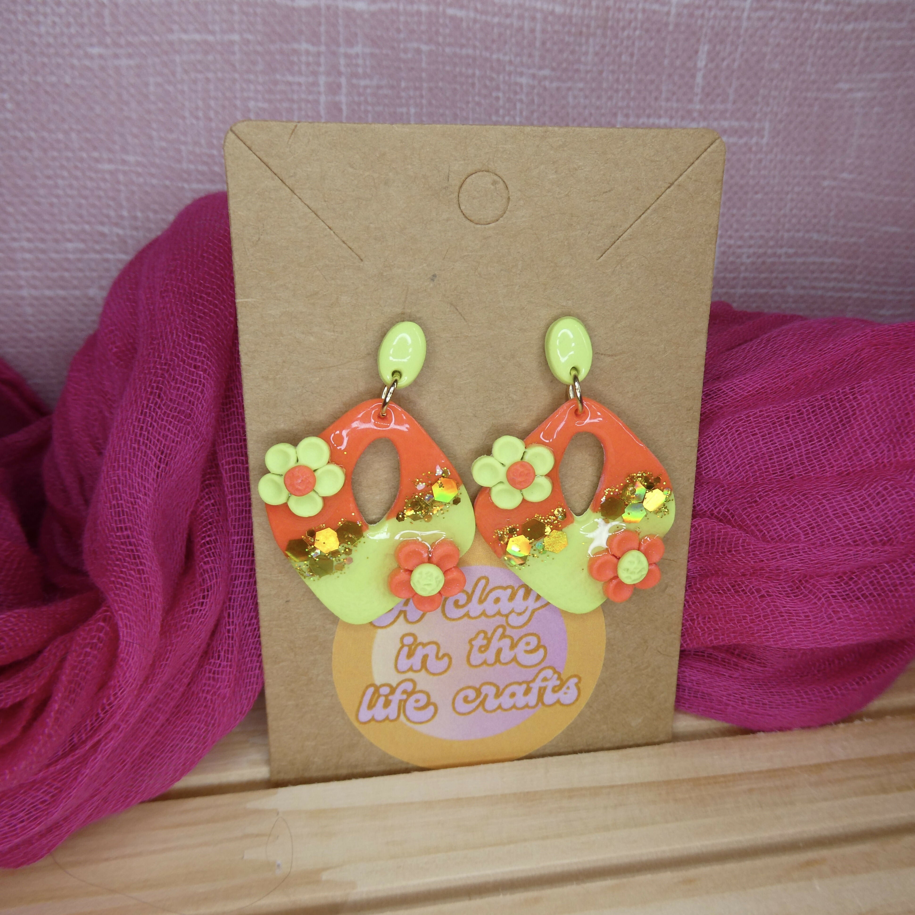Coral And Lime Green Diamond Polymer Clay Earrings With Flower And Glitter Detail
