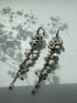 Cascading Flower Drop Earrings with Mini Floral Clusters in White and Silver