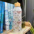 Moth - 25oz Glass Water Bottle with Bamboo Lid