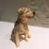 Ceramic border terrier dog sculpture
