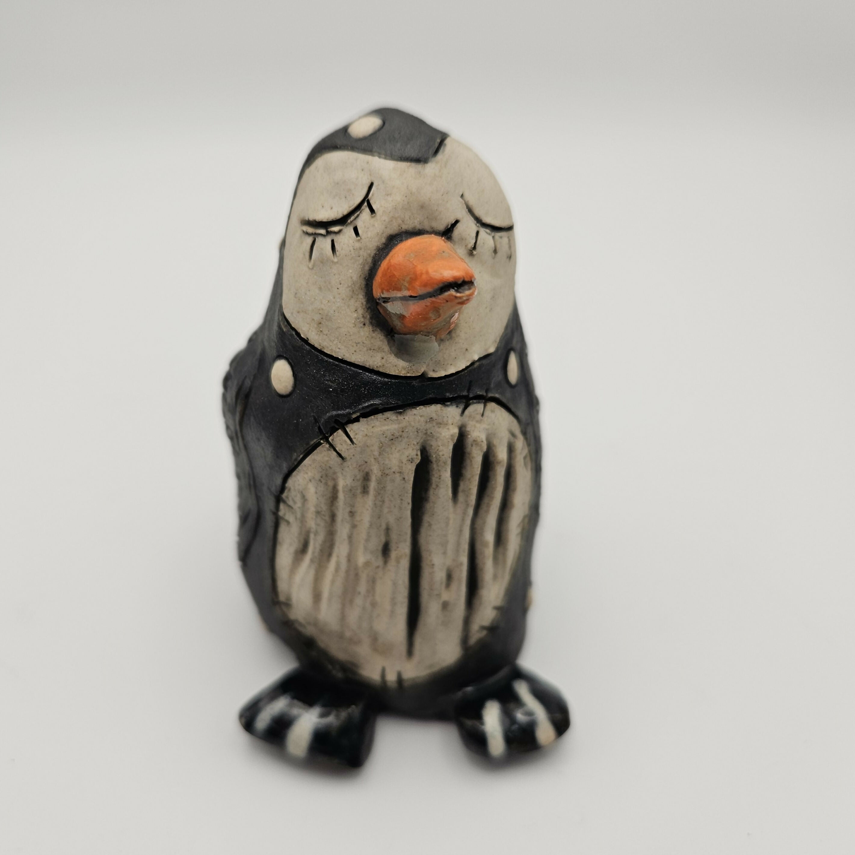 CHARMING CERAMIC PENGUIN.