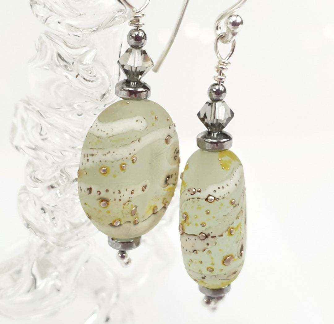 HAND LAMPWORKED ETCHED DROP GLASS EARRINGS, WITH STERLING SILVER EAR WIRES AND SWAROVSKI CRYSTALS.