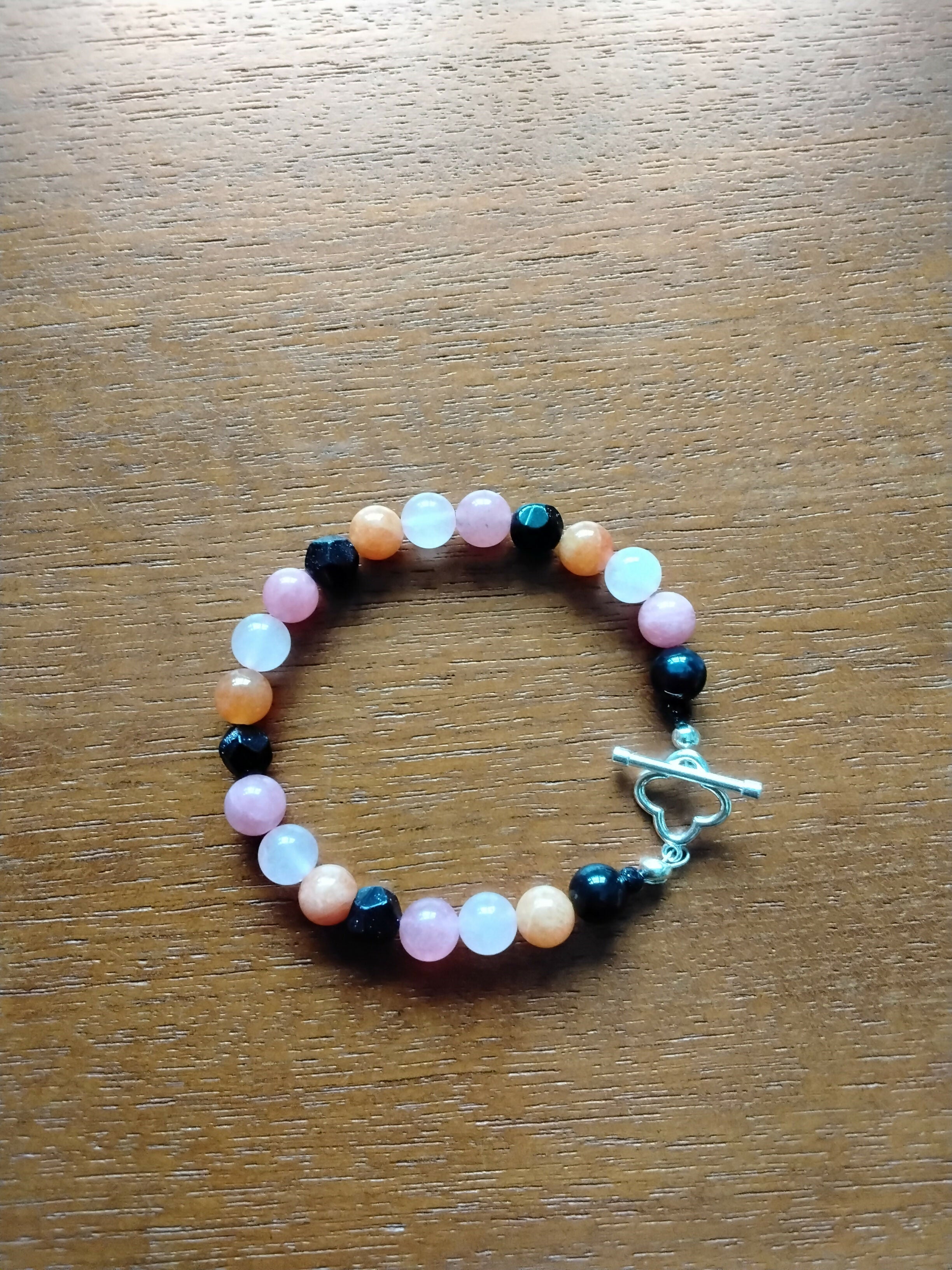 Tibetan Silver Toggle Catch Bracelet with Faceted Navy Goldstone, Orange Chalcedony, Strawberry Quartz & Rose Quartz.