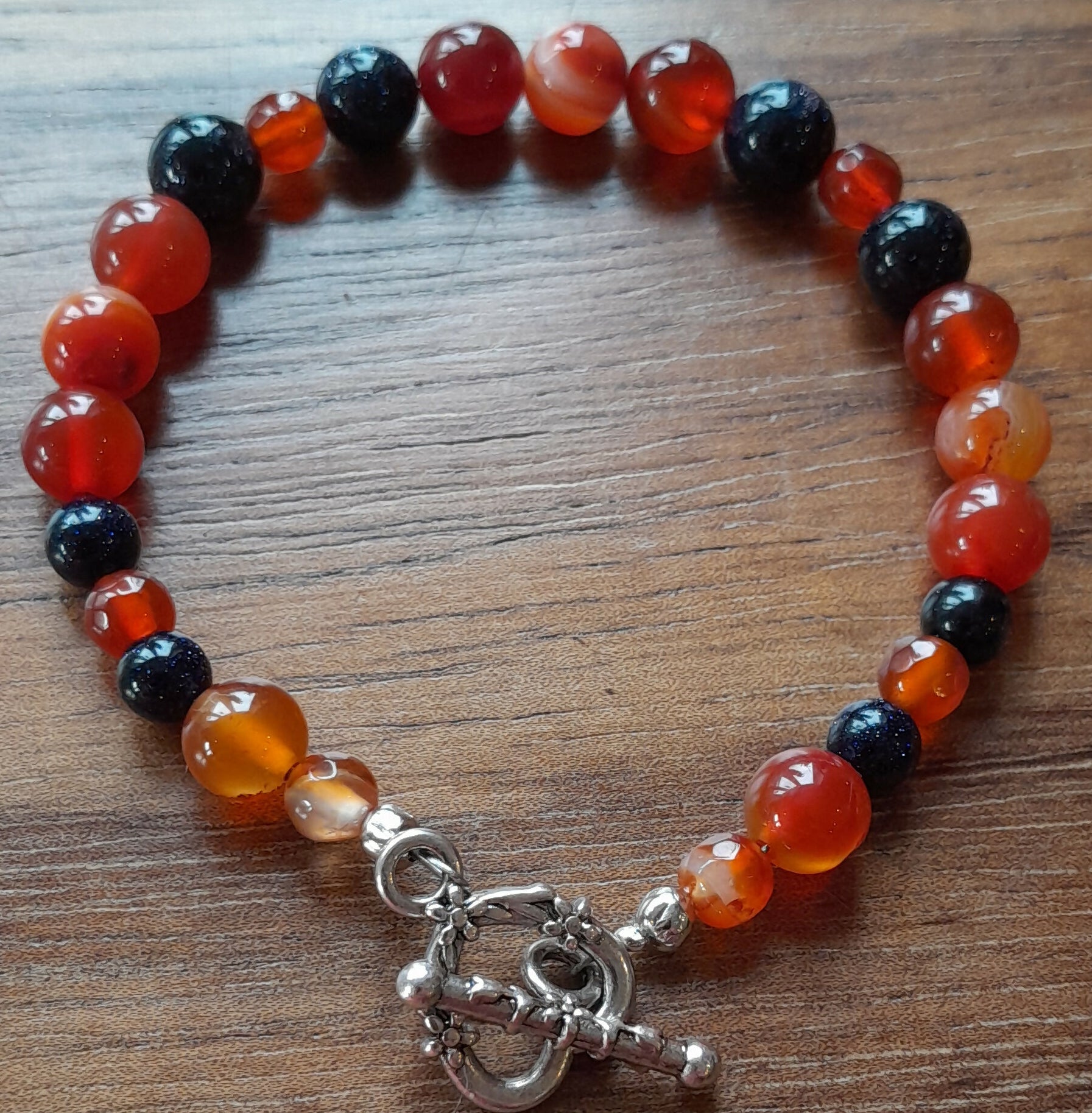 Gemstone Bracelet with a Tibetan Silver Toggle Catch, Carnelian and Navy Goldstone.