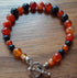 Gemstone Bracelet with a Tibetan Silver Toggle Catch, Carnelian and Navy Goldstone.