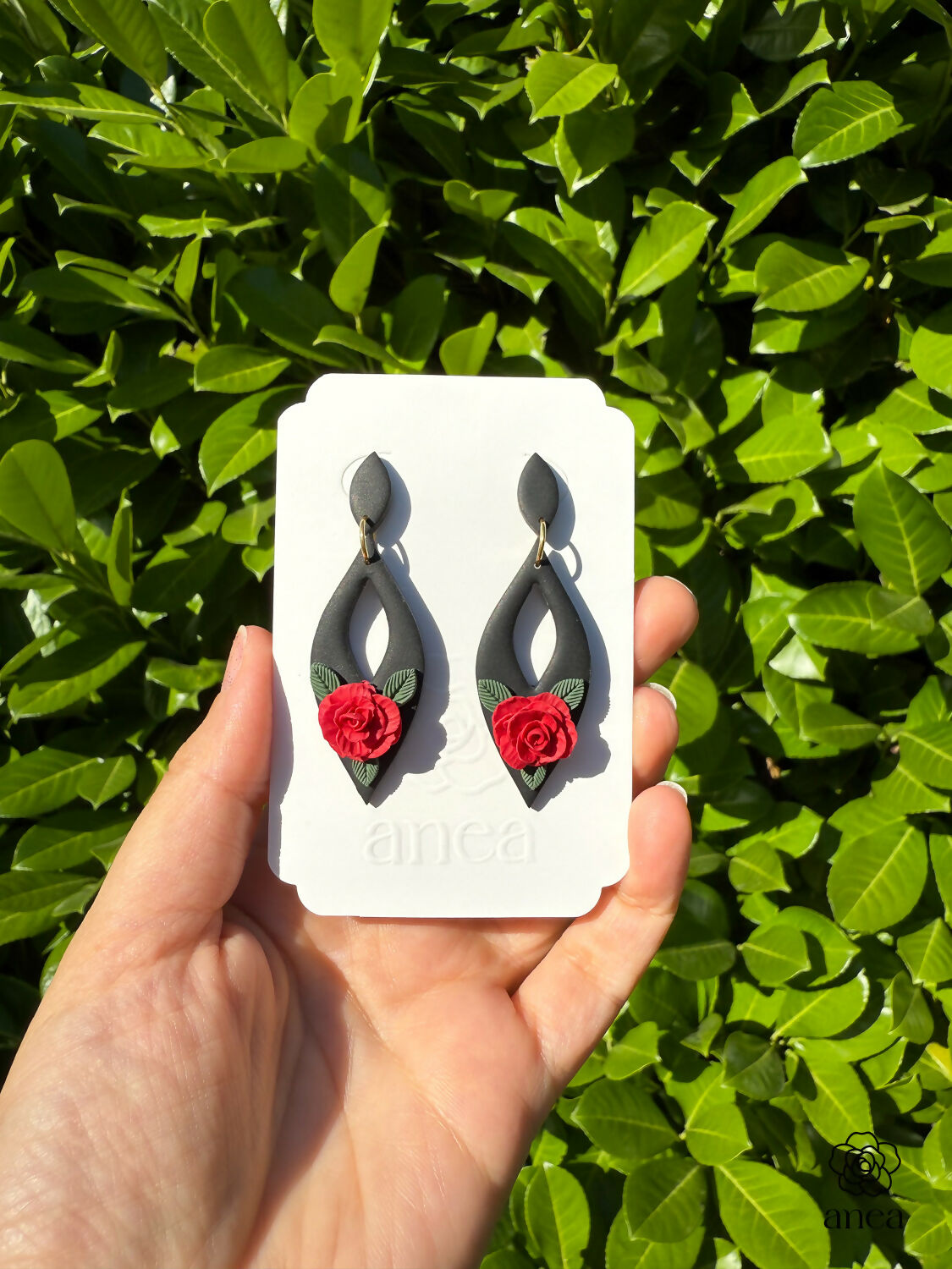 Black Drop Earrings with Hand-Sculpted Red Rose and Floral Detail