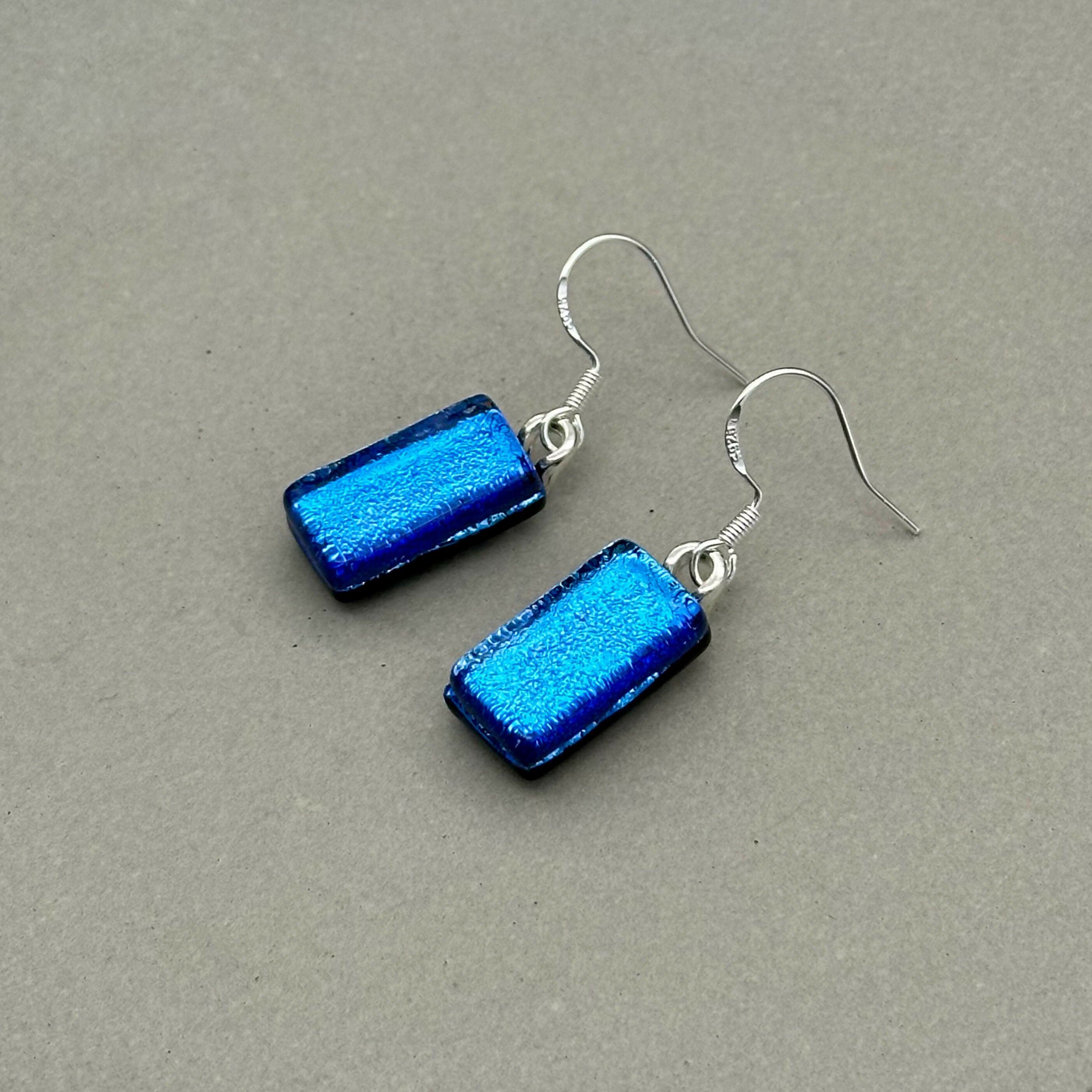 Light Blue Dichroic Fused Glass Dangle Sterling Silver Earrings - Handmade by Jade Tapson Glass.