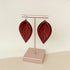 Maroon Lace Print Pinched Leaf Shaped Earrings in Faux Leather