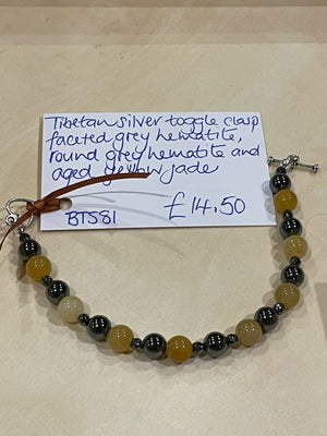 Tibetan Silver Toggle Clasp Bracelet Faceted Grey Hematite, Round Grey Hematite and Aged Yellow Jade