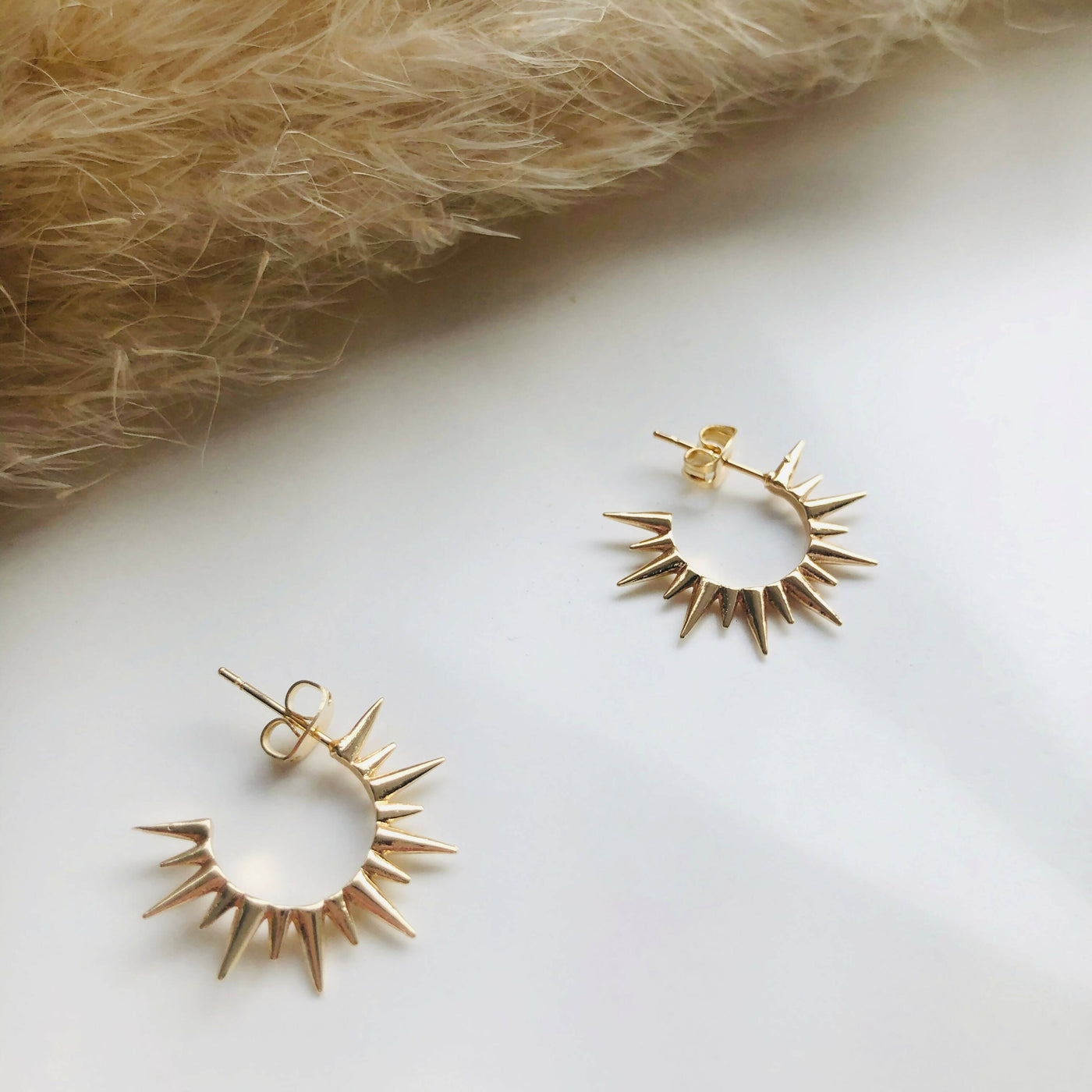 Spike hoop hot sale earrings gold