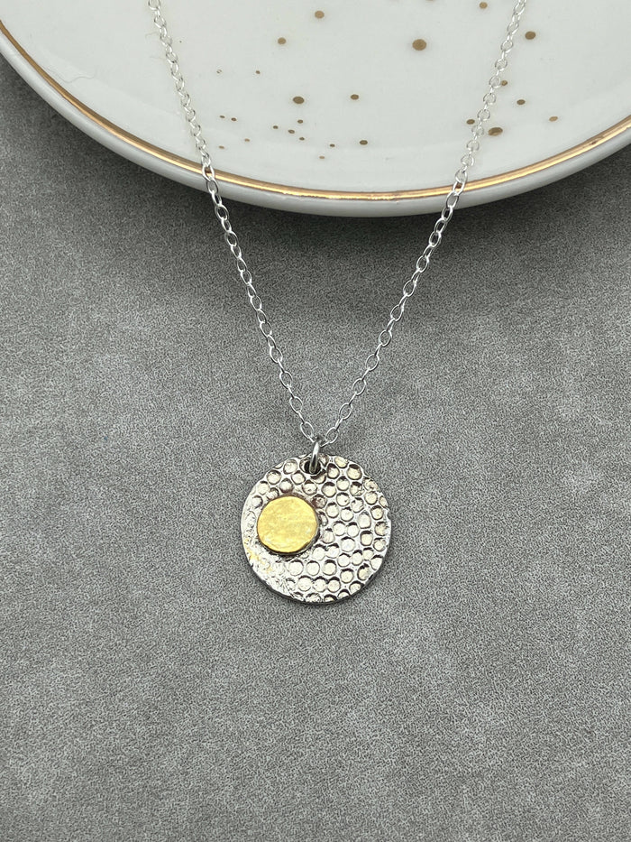 Round Silver Pendant with Gold Accent