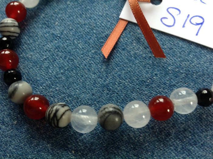 S19 Rose quartz, onyx, carnelian and black silkstone bracelet.