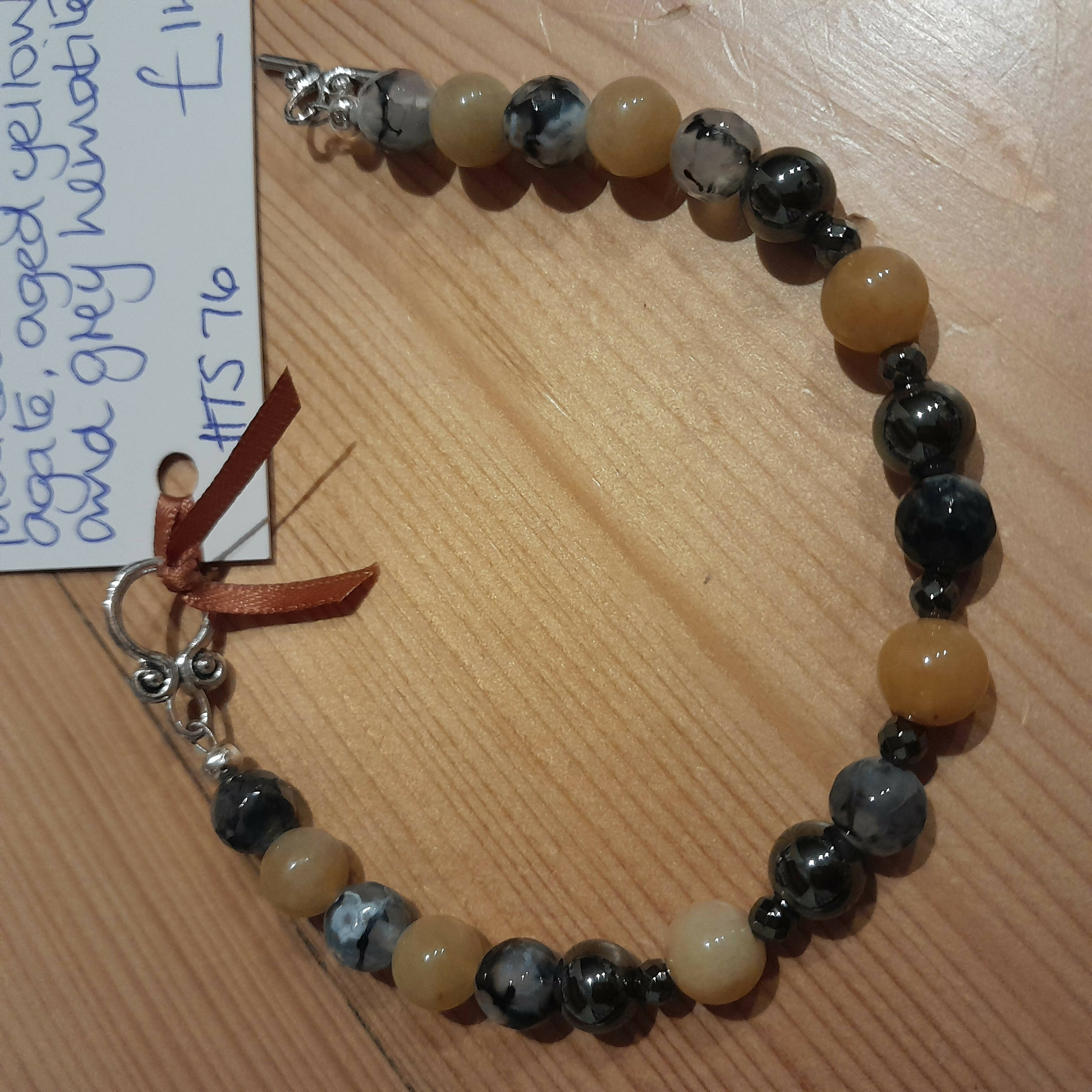 Tibetan Silver Toggle Clasp Bracelet with Faceted Dragon Vein Fire Agate, Aged Yellow Jade and Grey Hematite
