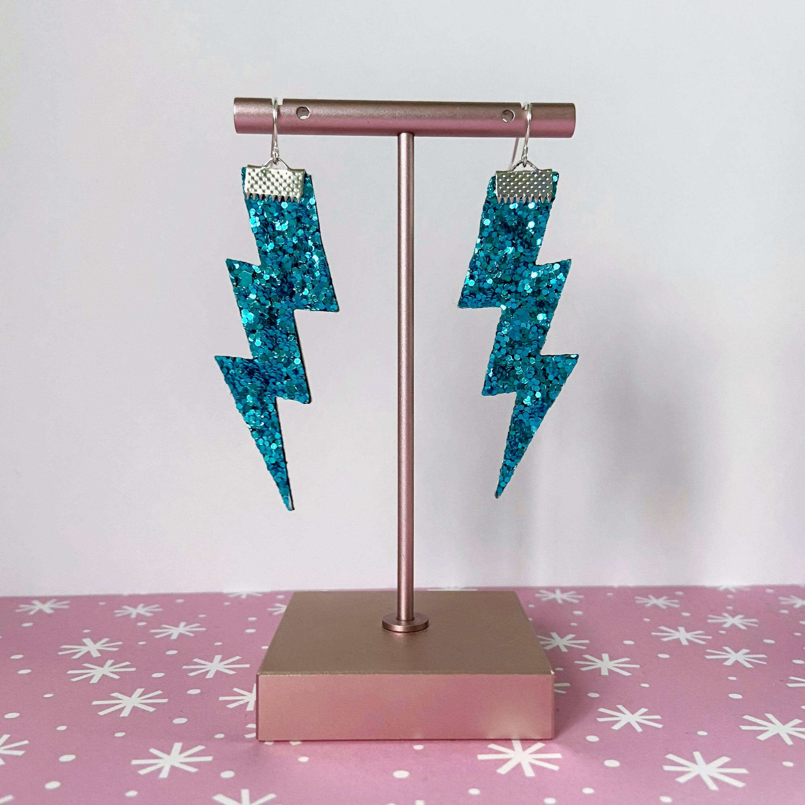 Flash Lightning Bolt Earrings in Light Blue Glitter