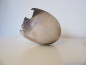 Smoke fired egg form vessel