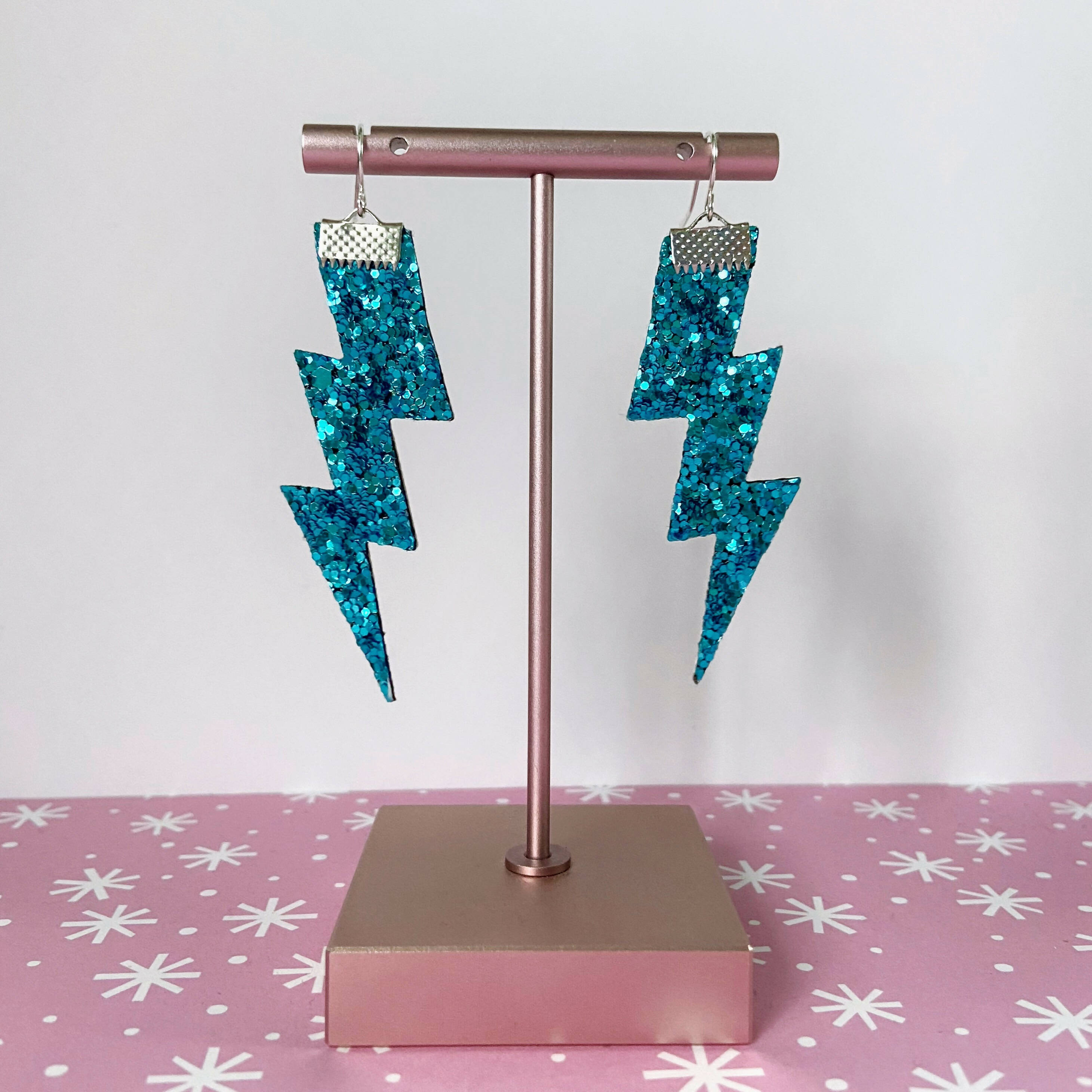 Flash Lightning Bolt Earrings in Light Blue Glitter