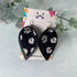 Daisy Print and Black Pinched Leaf Shaped Earrings in Faux Leather